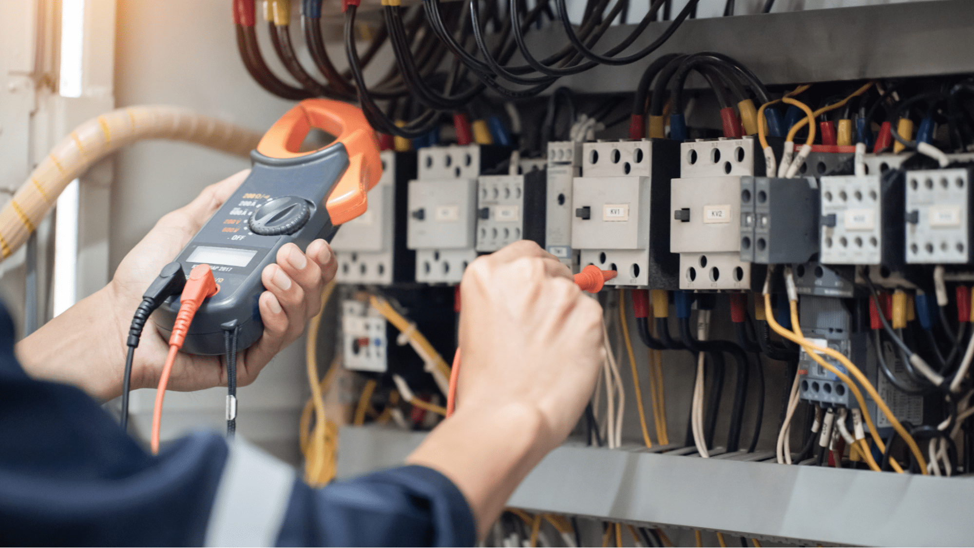 electrician testing a panel
